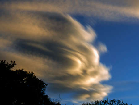 Multiple exposure of a  big cloud at sunrise over the central mountains of Colombia near the town of Villa de Leyva.の写真素材