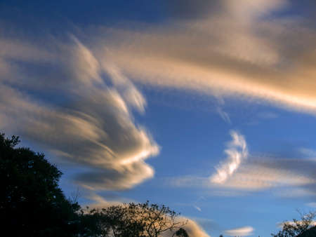 Multiple exposure of some clouds at sunrise over the central mountains of Colombia near the town of Villa de Leyva.の写真素材