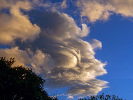 A  big cloud at sunrise over the central mountains of Colombia near the town of Villa de Leyva.の写真素材