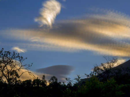 Multiple exposure of some clouds at sunrise over the central mountains of Colombia near the town of Villa de Leyva.の写真素材