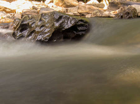 Multiple long exposure composite of the stream of the Moniquira river, a tropical tributary of the Suarez river, captured near the town of the same name in central Colombia.の写真素材
