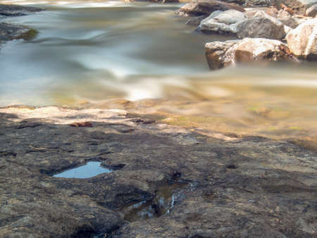 Multiple long exposure composite of the stream of the Moniquira river, a tropical tributary of the Suarez river, captured near the town of the same name in central Colombia.の写真素材