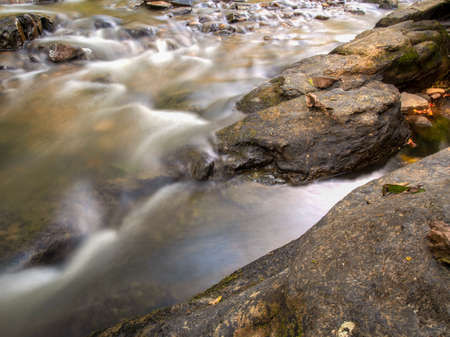 Multiple long exposure composite of the stream of the Moniquira river, a tropical tributary of the Suarez river, captured near the town of the same name in central Colombia.の写真素材