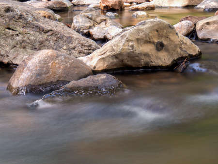 Multiple long exposure composite of the stream of the Moniquira river, a tropical tributary of the Suarez river, captured near the town of the same name in central Colombia.の写真素材