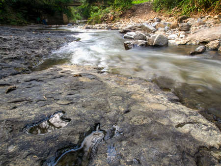 Multiple long exposure composite of the stream of the Moniquira river, a tropical tributary of the Suarez river, captured near the town of the same name in central Colombia.の写真素材