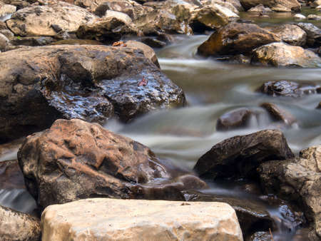 Multiple long exposure composite of the stream of the Moniquira river, a tropical tributary of the Suarez river, captured near the town of the same name in central Colombia.の写真素材