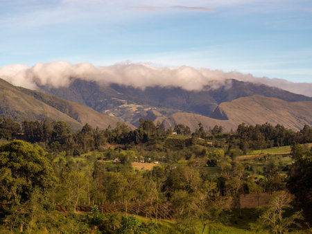 The top of the Iguaque mountain covered by a dense cloud at sunset, near the town of Arcabuco in the  eastern Andes of central Colombia.の写真素材