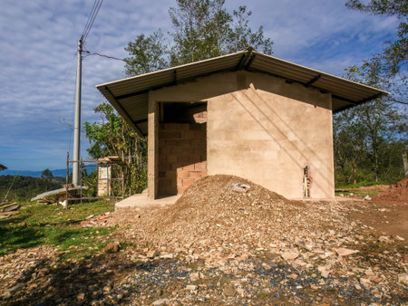 The light of the sunrise falls over the construction site of a workshop in a farm in the eastern Andean mountains of central Colombia, near the town of Arcabuco.の写真素材