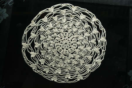 beautiful white tablecloth for centerpiece hand-knitted with crochet technique. centerpiece folder...