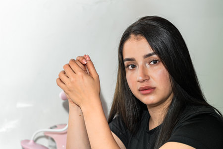 portrait of beautiful young latin woman, entrepreneur looking very confident on her faceの写真素材