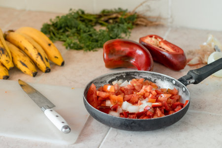 close-up of a frying pan with chopped vegetables ready for preparation of a stewの写真素材