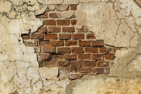 Textured wall with brick and stucco