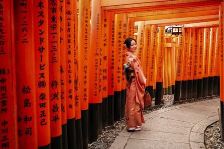 KYOTO, JAPAN - APRIL 02, 2019: Kimono in red shorts in Kyoto, Japanのeditorial素材