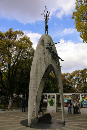 HIROSHIMA, JAPAN - APRIL 01, 2019: Tourists visiting Children's Peace Monument, to commemorate Sadako Sasaki and the children victims of the atomic bombingのeditorial素材