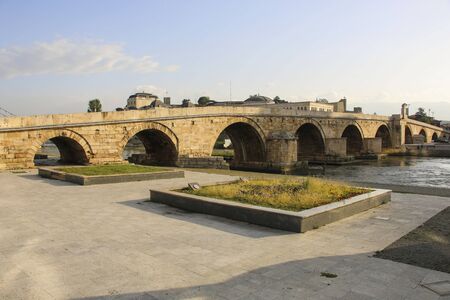 Old stone Bridge intersecting the Vardar river in Skopje, Republic of North Macedonia.の写真素材