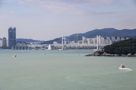 BUSAN, SOUTH KOREA- OCTOBER 16, 2019: Gwangan bridge (Diamond Bridge) and Haeundae in Busan, South Koreaのeditorial素材
