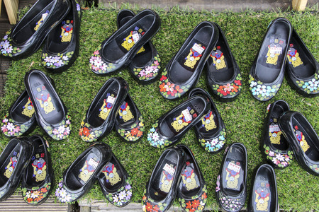 BUSAN, SOUTH KOREA- OCTOBER 17, 2019: Korean traditional flower shoes, famous lucky souvenir in Busan, South Korea.のeditorial素材