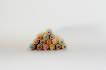 many colored pencils in a multicolored designの写真素材