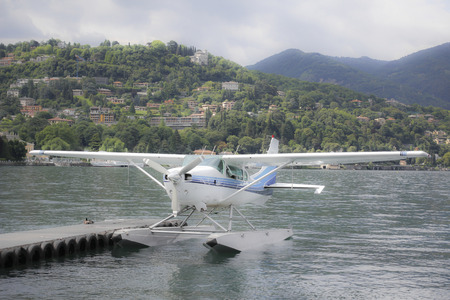 hydroplane still on the dock of the lake in passenger waiting for a new take offの写真素材