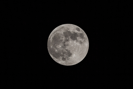 full moon with its craters and the black skyfull moon with its craters and the black skyの写真素材