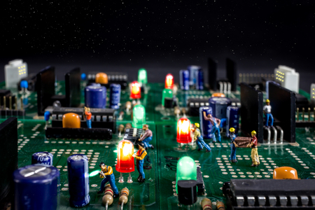 men work on a starry night in a electronic city