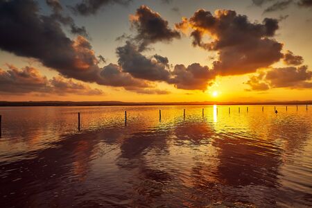 sunset in salty lagoon torrevieja alicanteの写真素材