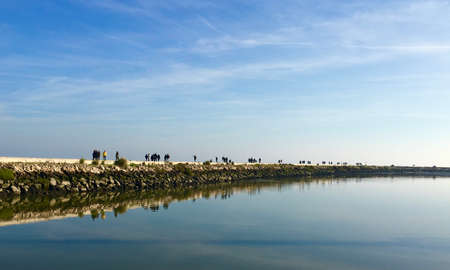 People walking on a beautiful sunny day at Parque das Nacoes or Park of Nationsのeditorial素材