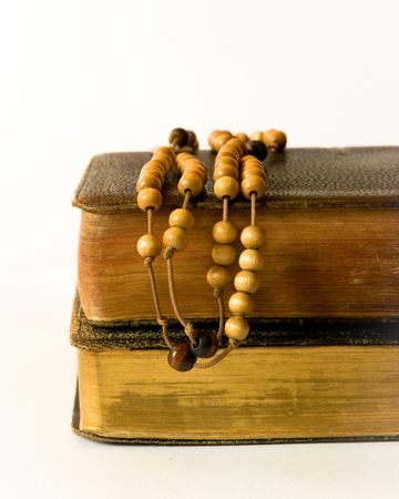The book of Catholic Church liturgy and rosary beadsの写真素材