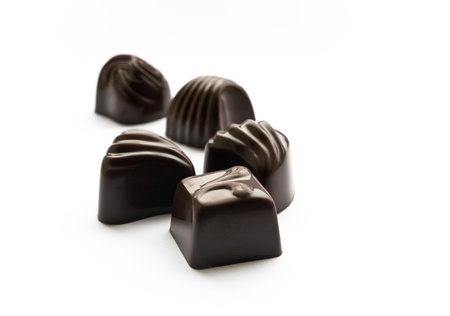 some chocolate sweets on a white backgroundの写真素材