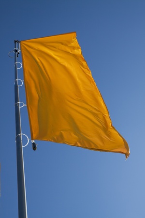 the flag is flapping in the windの写真素材