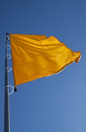 the flag is flapping in the windの写真素材