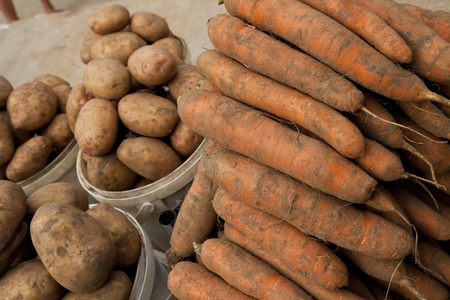Potato and carrot on local marketの写真素材