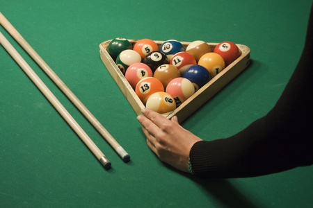 The start of the game of pool (billiard). Episode of pool game play