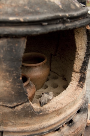 Old pottery kiln and pot. Pottery themeの写真素材