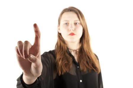 Girl pushing the virtual buttonの写真素材