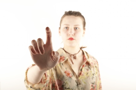 Girl pushing the virtual buttonの写真素材