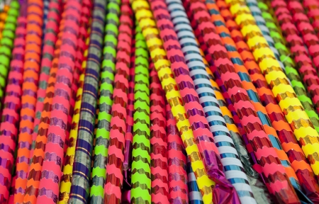 Background of long colored sweet sticksの写真素材
