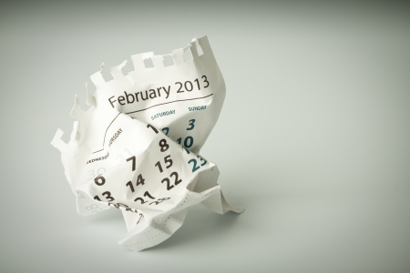 February. Calendar sheet. Crumpled paper on the floor.の写真素材