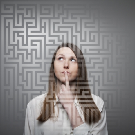 Young woman looking for the solution. の写真素材