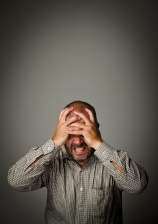 Frustrated  Expressions, feelings and moods  Man suffering from headache の写真素材