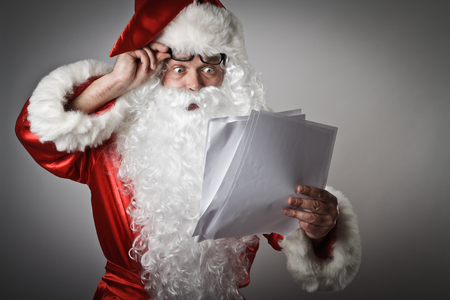 Santa Claus is reading the lettersの写真素材