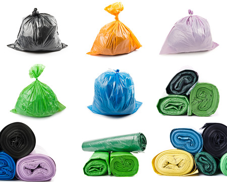 A set of colored garbage bags isolated on white background. Collage of garbage bags.の写真素材