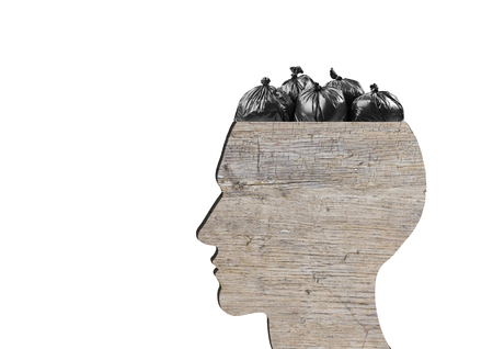 Head as wooden dustbin is full of garbage bags on white background. Garbage concept.の写真素材