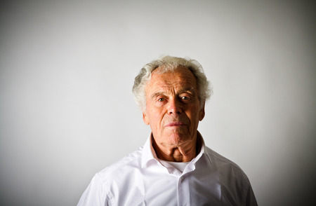 Old man in white. Portrait of Old Man