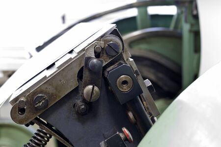 Machine for stitching book pages. The elements of the machine for stitching book pages with threads...