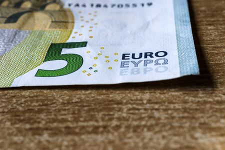 Five euro. European currency. Money as background. Macro.
