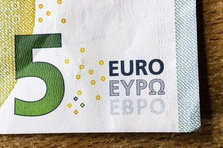 Five euro. European currency. Money as background. Macro.