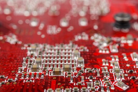 Graphic card. Part of red graphic card as background. Technology and Electronics Industry. Macro.の写真素材