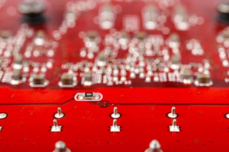 Graphic card. Part of red graphic card as background. Technology and Electronics Industry. Macro.の写真素材