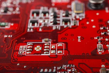 Graphic card. Part of red graphic card as background. Technology and Electronics Industry. Macro.の写真素材